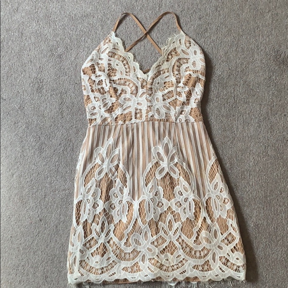 Super cute tan and white lace mini dress! Sz small
